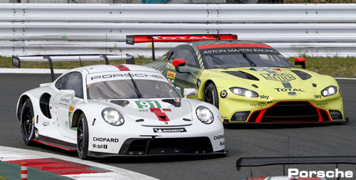 Porsche vs. Aston